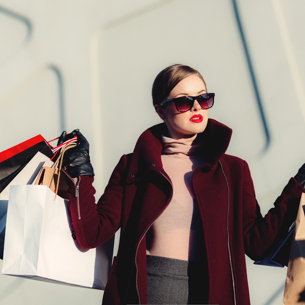 Fashion-forward outfit flat lay with statement accessories reflecting current social trends