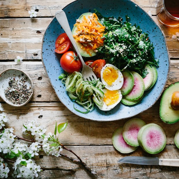 Close-up of nutrient-rich salad ingredients representing gut-friendly whole foods