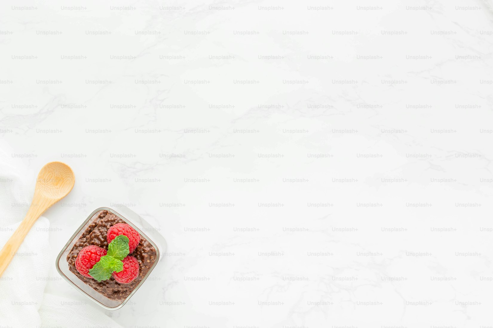 Chocolate pudding with raspberries as a rich low-sugar dessert idea