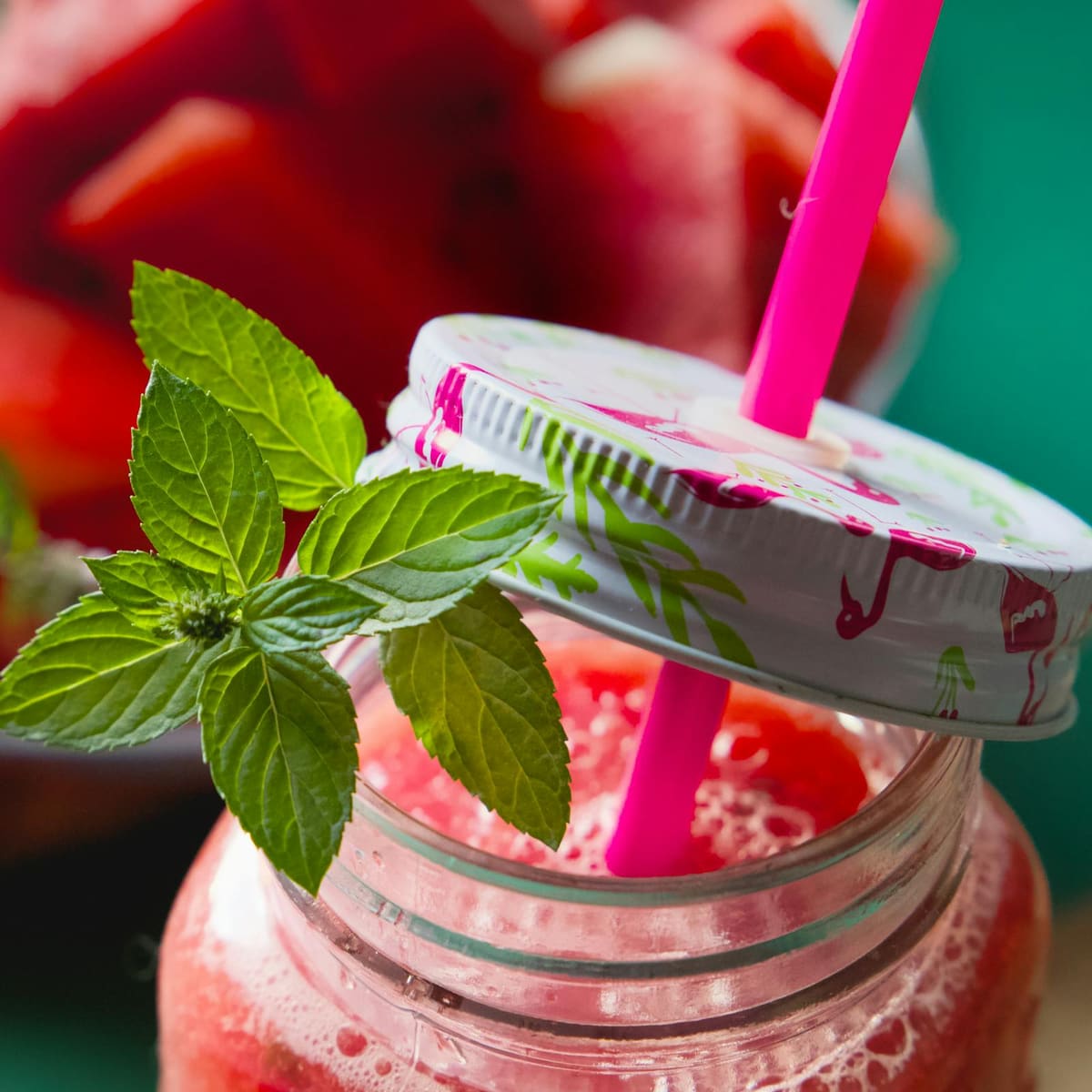 Fresh detox-style watermelon juice in a clear glass on a bright table